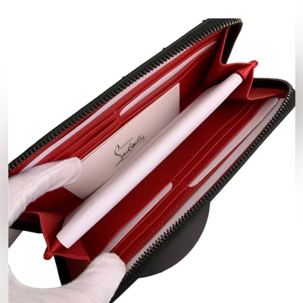 Like New Used Twice Christian Louboutin Black Studded Zip Wallet with Red Accent